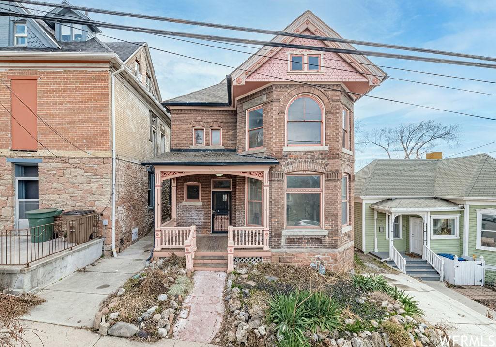 brick victorian home for sale